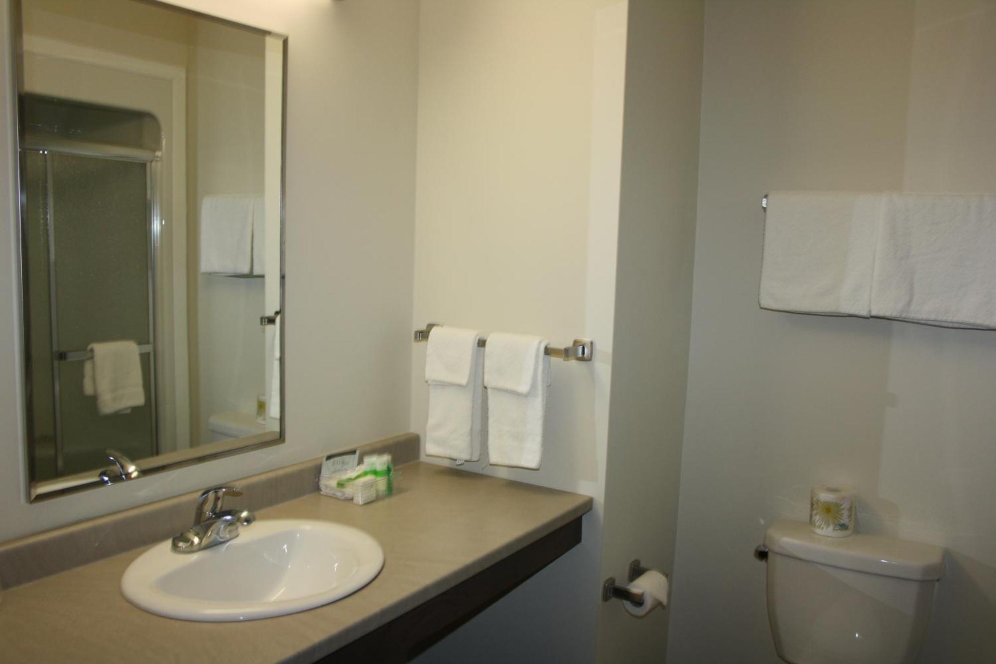 Crossroads Inn & Suites Paradise Rum bild